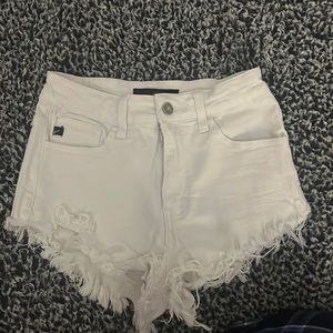 White KanCan jean shorts size 23.